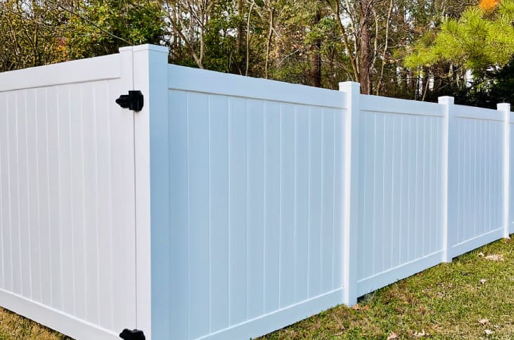 Newly installed white vinyl fence in Alpharetta, GA