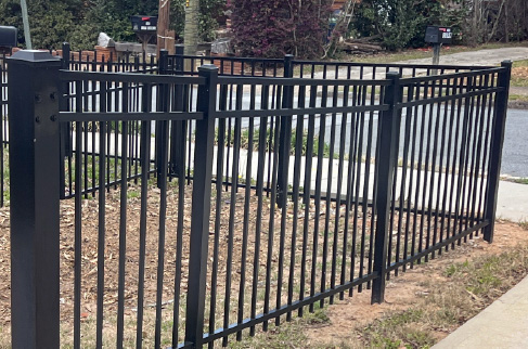 white wooden picket fence with landscaped yard Alpharetta