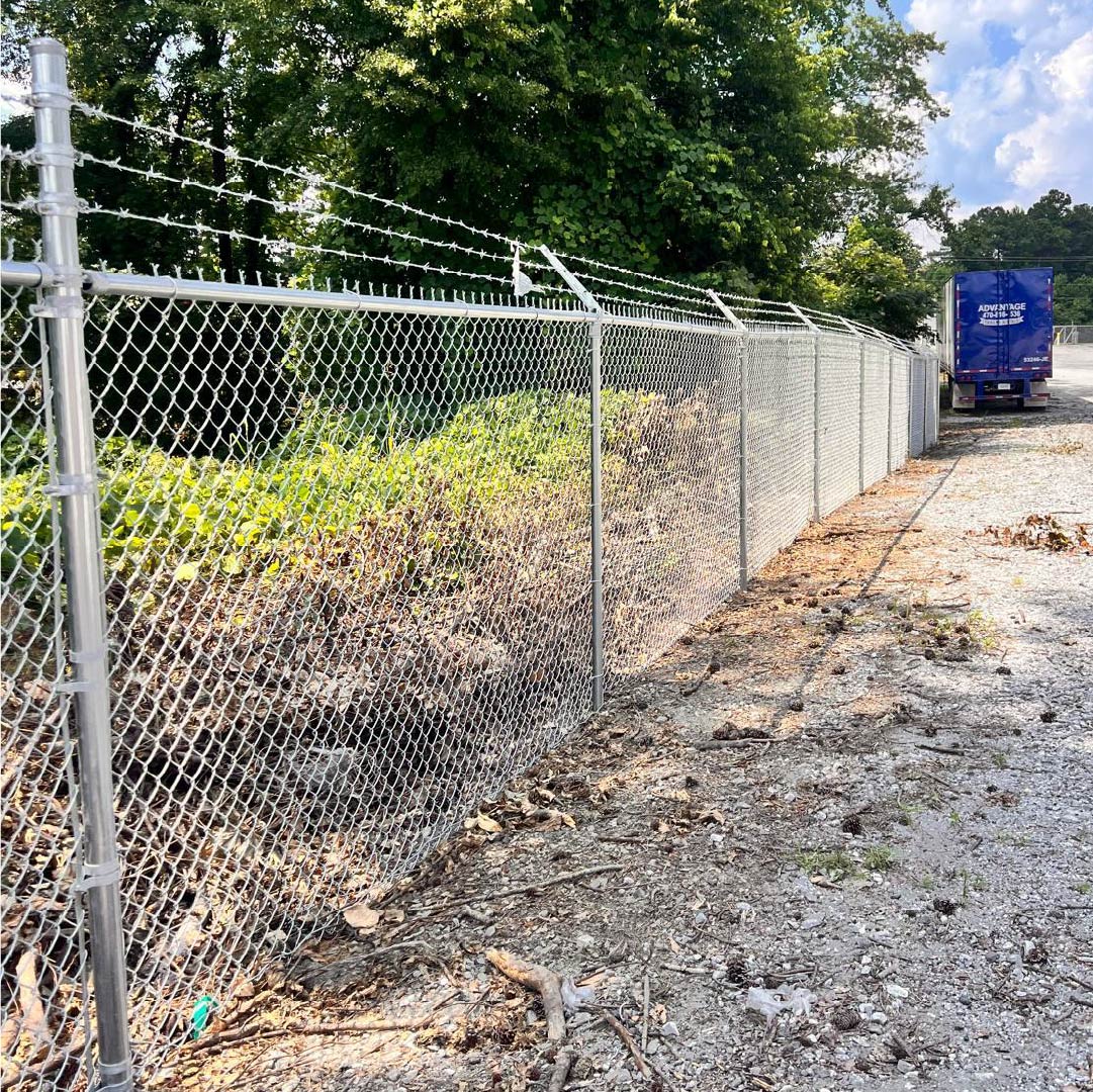 Secure chain link fencing surrounding Alpharetta commercial property