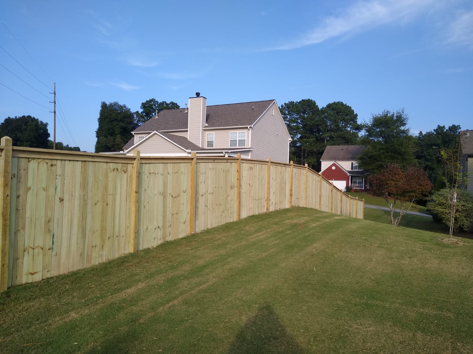 Finished Wood fence installation with secure and attractive design in Atlanta Metro Area, GA.