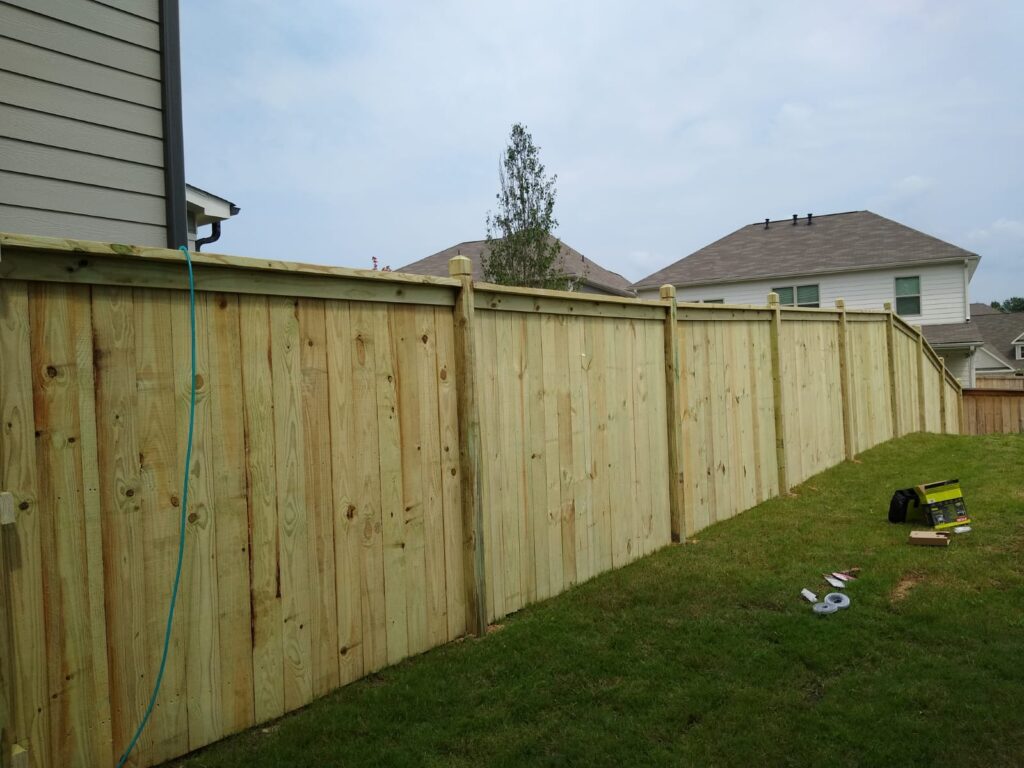 Cedar wood fence panels installed by Hawk Fences LLC in Buford