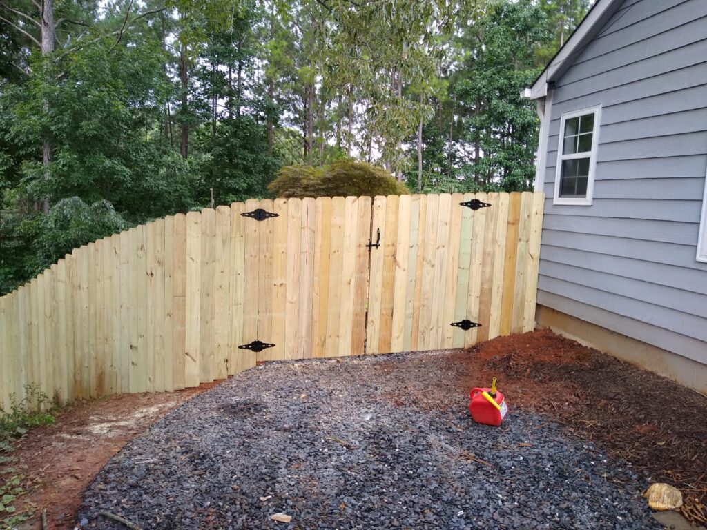 Finished privacy fence installation with secure and attractive design in Dacula, GA.