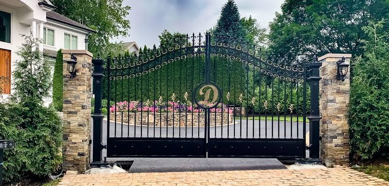 Metal driveway gates by Hawk Fences LLC in Peachtree Corners, GA