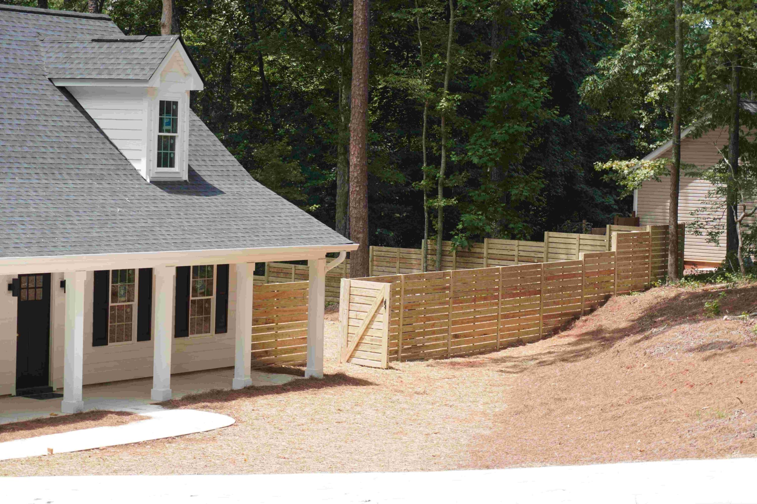 What Is a Step-Down Fence? A Guide for Uneven Properties